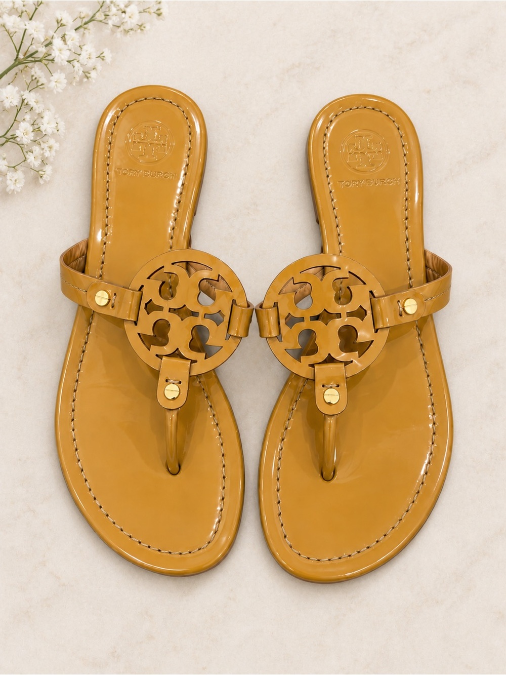 Tory Burch Patent Logo Thong Sandals in Honey Tan